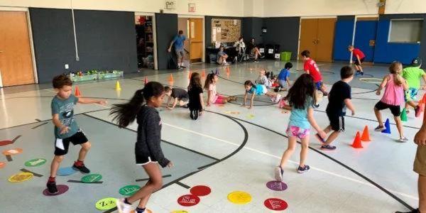 kids doing a variety of relay games and fitness activities